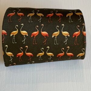 Silk Flamingo tie. This tie is brown and it has flamingos EUROPEENNES